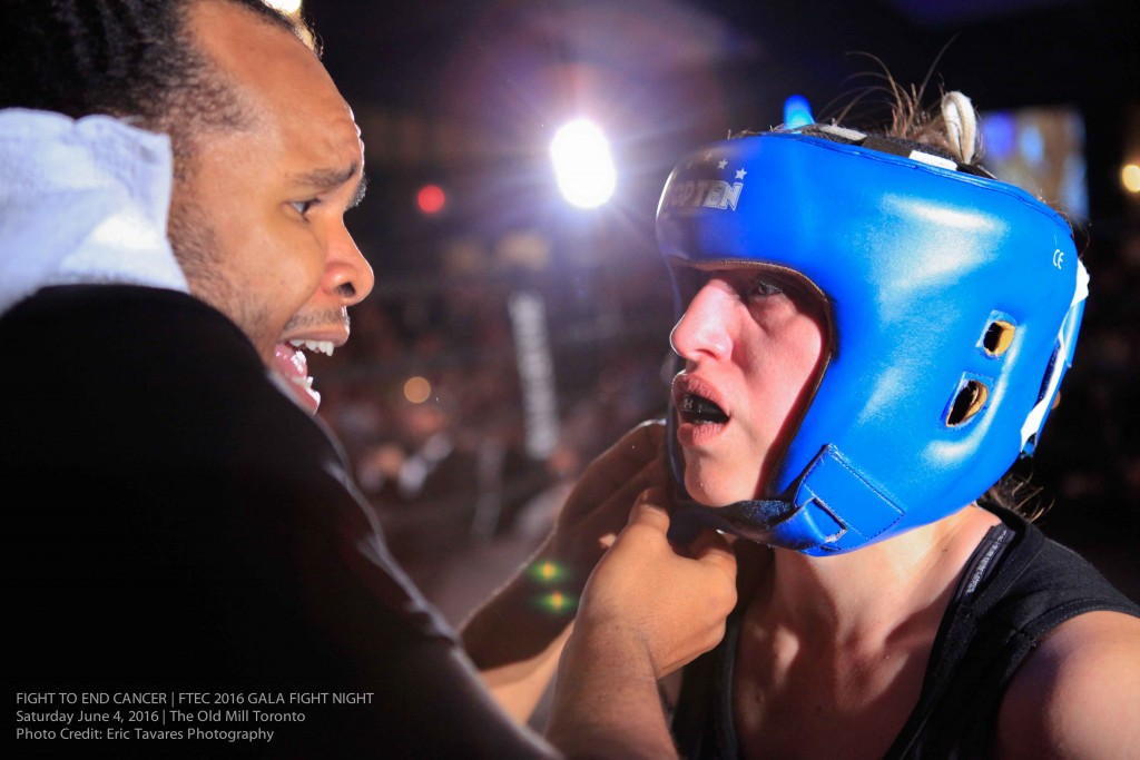 Fight Team Head Coach, Virgil Barrow, gives Co-Main Event's Natasa Jamnik-Sousa final instruction, as she heads into round 3 of her fight. Photo Credit: Eric Tavares