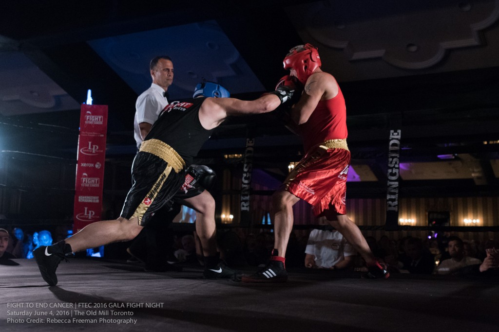 Main Event, Craig Lauzon lands a right-cross on his opponent Cory Raymond - all in the name of knocking out cancer! Photo Credit: Rebecca Freeman