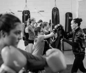 Jennifer Huggins leads the Girls Teens class at Kingsway Boxing, sharing her passion for the sport that changed her life. Photo Credit: Virgil Barrow