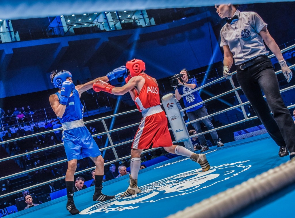 Jennifer Huggins referees a semifinal bout between Kazakhstan and Australia in the AIBA Men's Youth World Championships in St. Petersburg Russia. Photo Credit: AIBA International Boxing