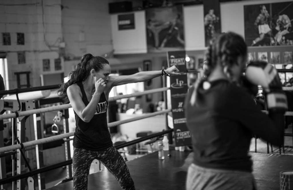 Photo Credit: Virgil Barrow Photography | Jennifer Huggins coaching at her gym Kingsway Boxing Club